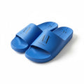 picknpack blue Armani Exchange pool slide sandals with black A|X logo on the strap and contoured footbed