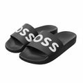 picknpack BOSS black synthetic pool slide sandals with a bold white logo on the strap and a contoured footbed.