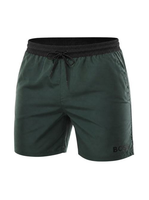picknpack BOSS forest green swim shorts with a black elasticated waistband, drawstring closure, and leg logo branding.