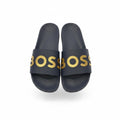 picknpack BOSS dark navy slide sandals with bold metallic gold embossed logo on the strap and contoured footbed