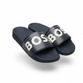 picknpack BOSS navy blue slide sandals with white logo print and multi-colored pinstripe details on the strap