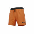 picknpack BOSS orange swim shorts with a black elastic waistband, drawstring, and logo detail on the leg.
