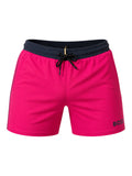picknpack BOSS hot pink swim shorts with a navy blue elastic waistband, drawstring closure, and side logo detail.
