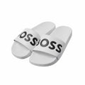 picknpack BOSS white pool slides with bold black logo print on the strap and a contoured footbed
