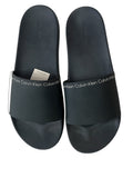 picknpack Calvin Klein black synthetic pool slide sandals with white logo branding on the wide strap