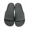 picknpack Calvin Klein black rubber slide sandals with embossed logo on textured straps and contoured footbeds