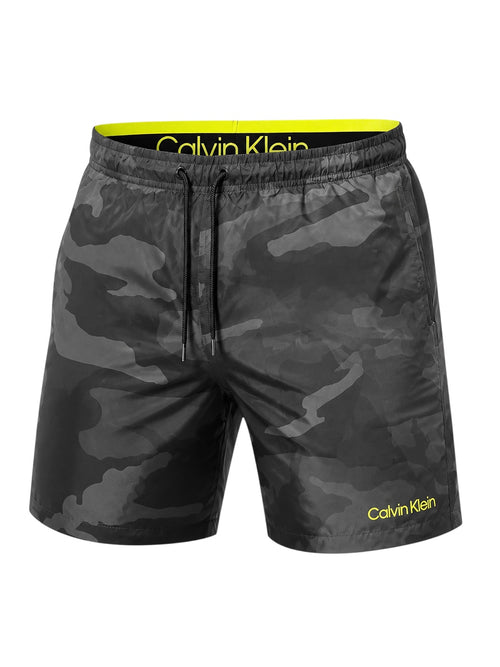 picknpack Calvin Klein dark grey camouflage swim shorts with a bright yellow interior waistband and logo detailing.