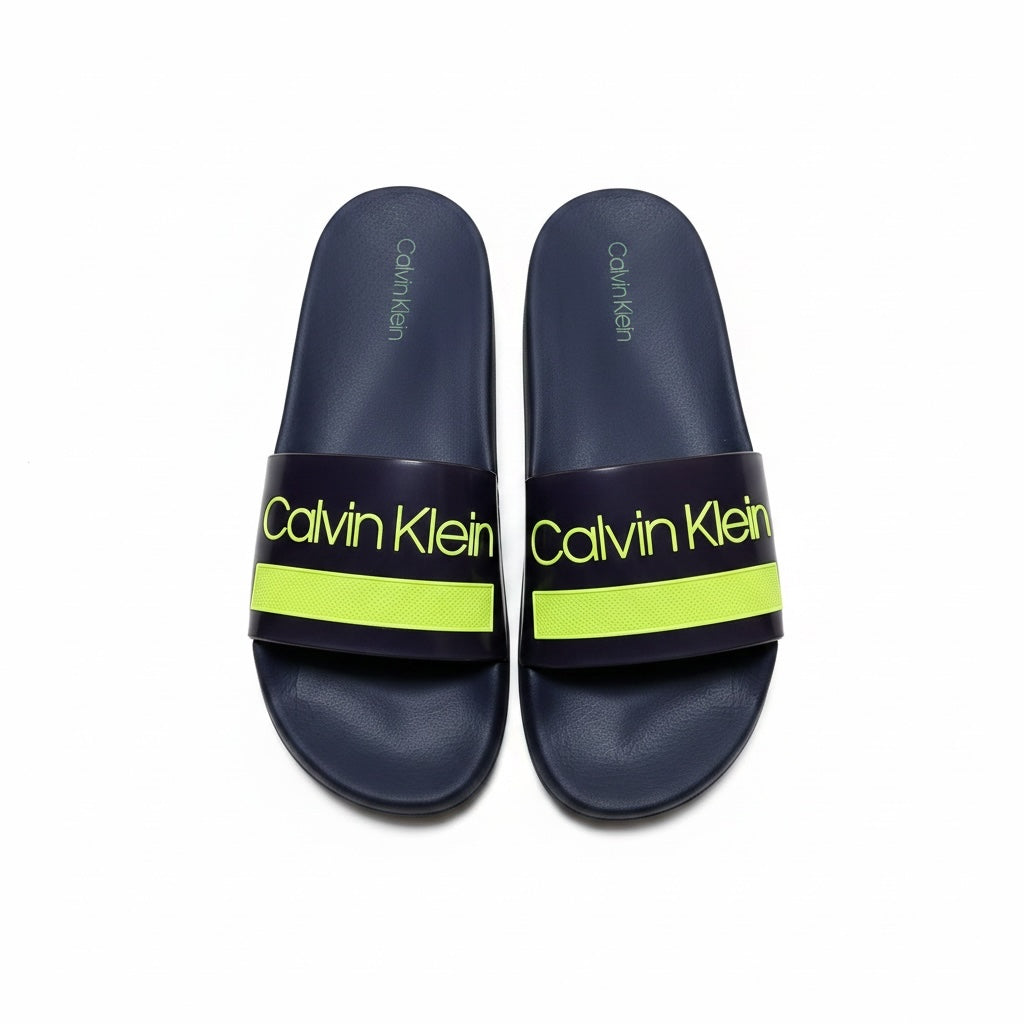 picknpack Calvin Klein navy pool slide sandals with neon yellow logo strap and contoured footbed