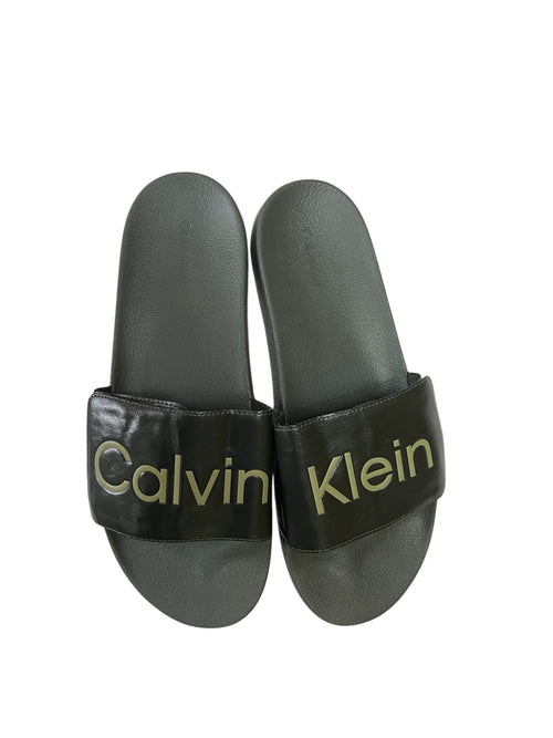 picknpack Calvin Klein olive slide sandals with a wide strap and embossed logo on a cushioned footbed