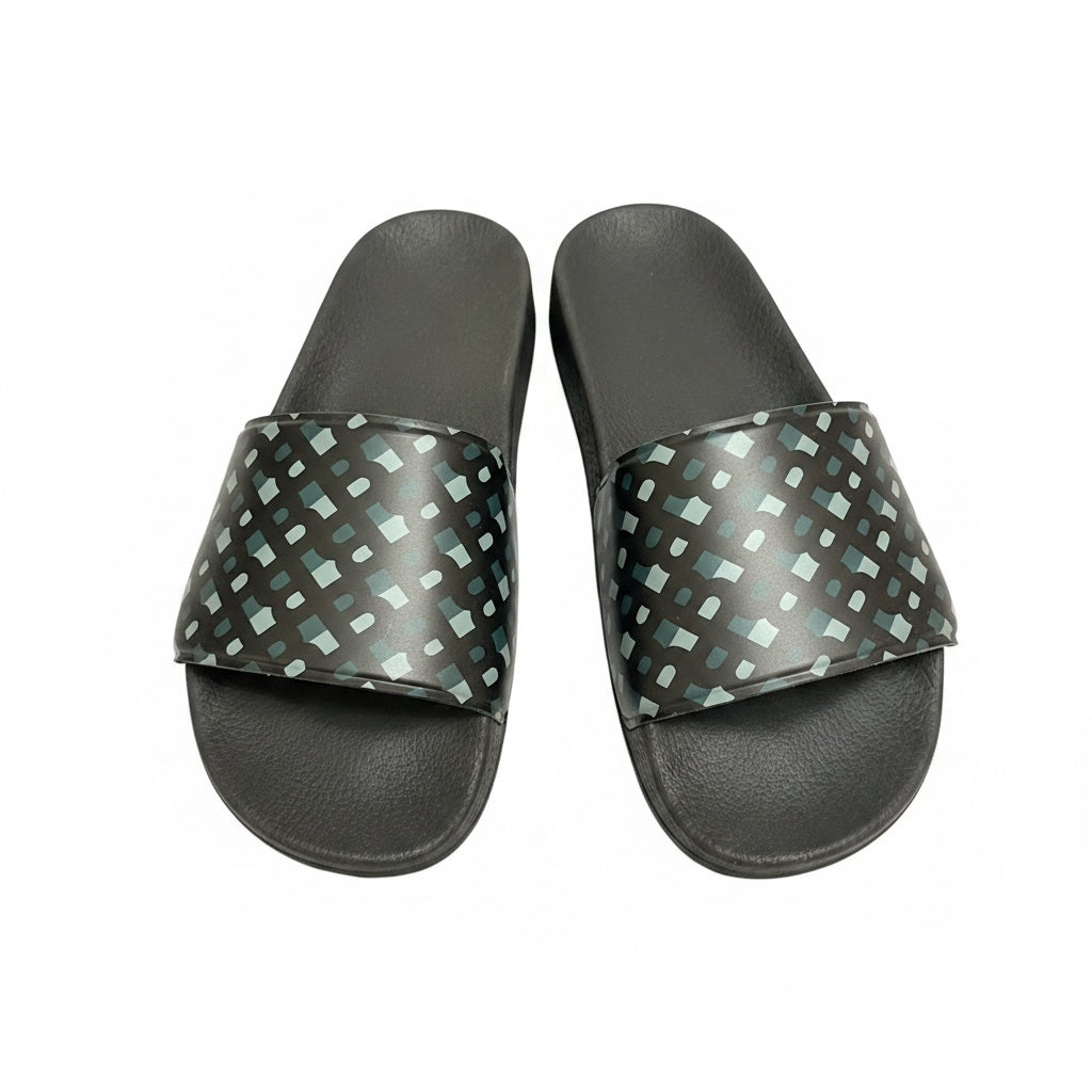 picknpack casual slide sandals with a dark base and geometric pattern on the strap, featuring a contoured footbed.