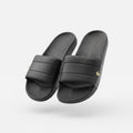 picknpack Lacoste men's black slide sandals with a textured strap and gold-tone crocodile logo on a white background