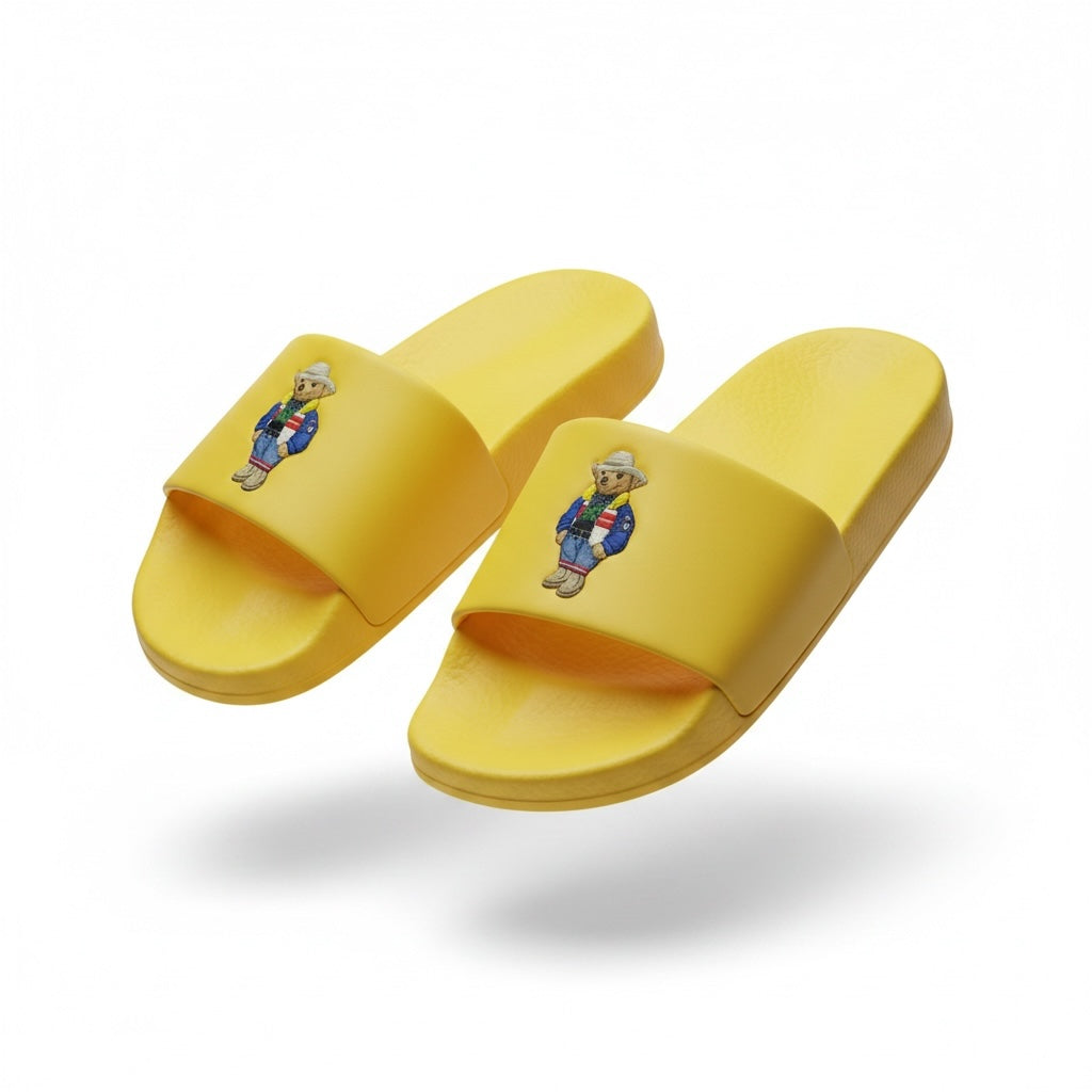 picknpack Polo Ralph Lauren yellow slide sandals featuring an embroidered bear graphic on the strap