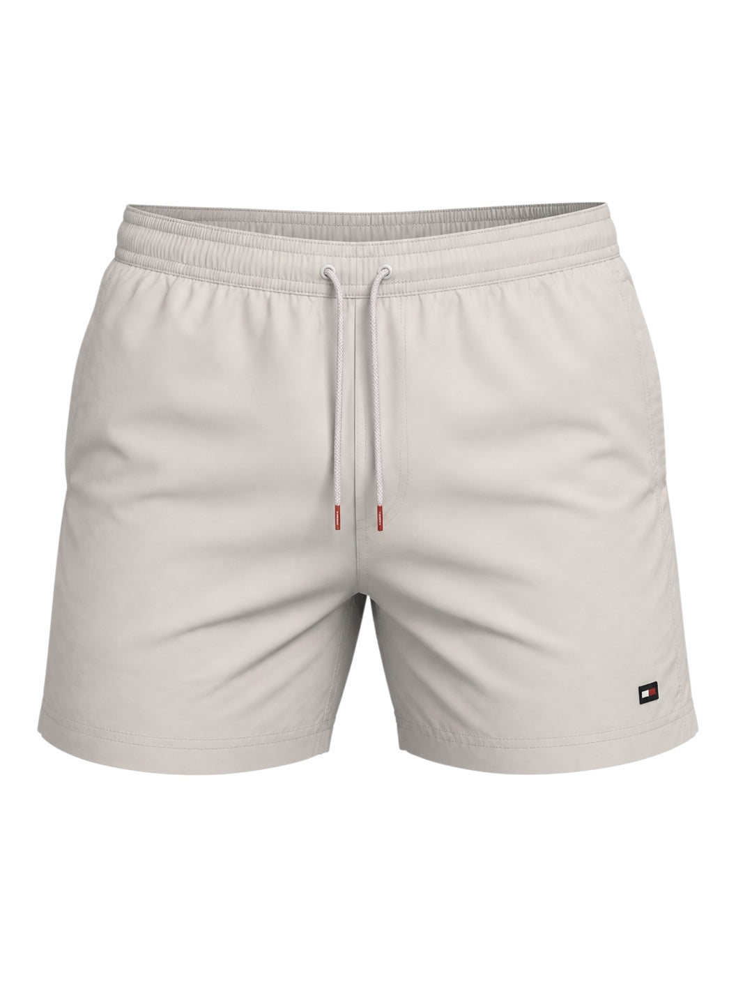 picknpack Tommy Hilfiger stone-colored swim shorts with an elastic drawstring waist and iconic flag logo patch.