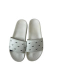 picknpack white slide sandals with repeating black bird logo pattern and contoured footbed for casual summer wear