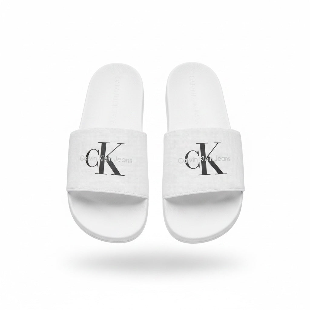 picknpack white Calvin Klein Jeans pool slide sandals with black logo on the strap and contoured footbed